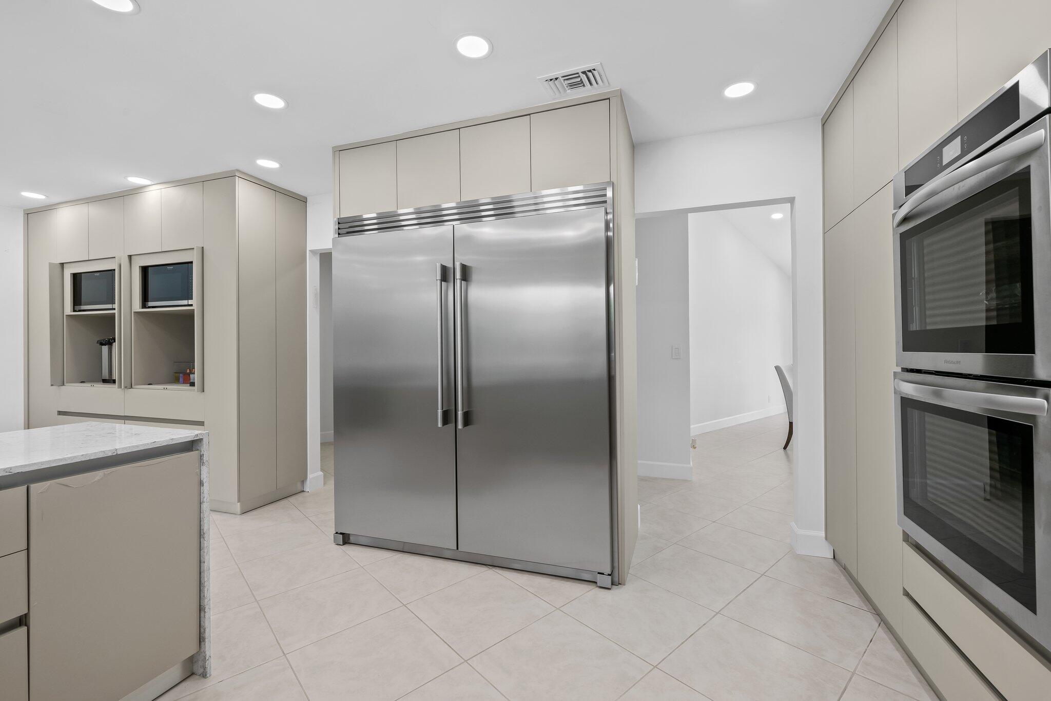 11937 Sandlake Drive Boca Raton, FL 33428 - Photo 23 of 54 a bathroom with a shower and a sink