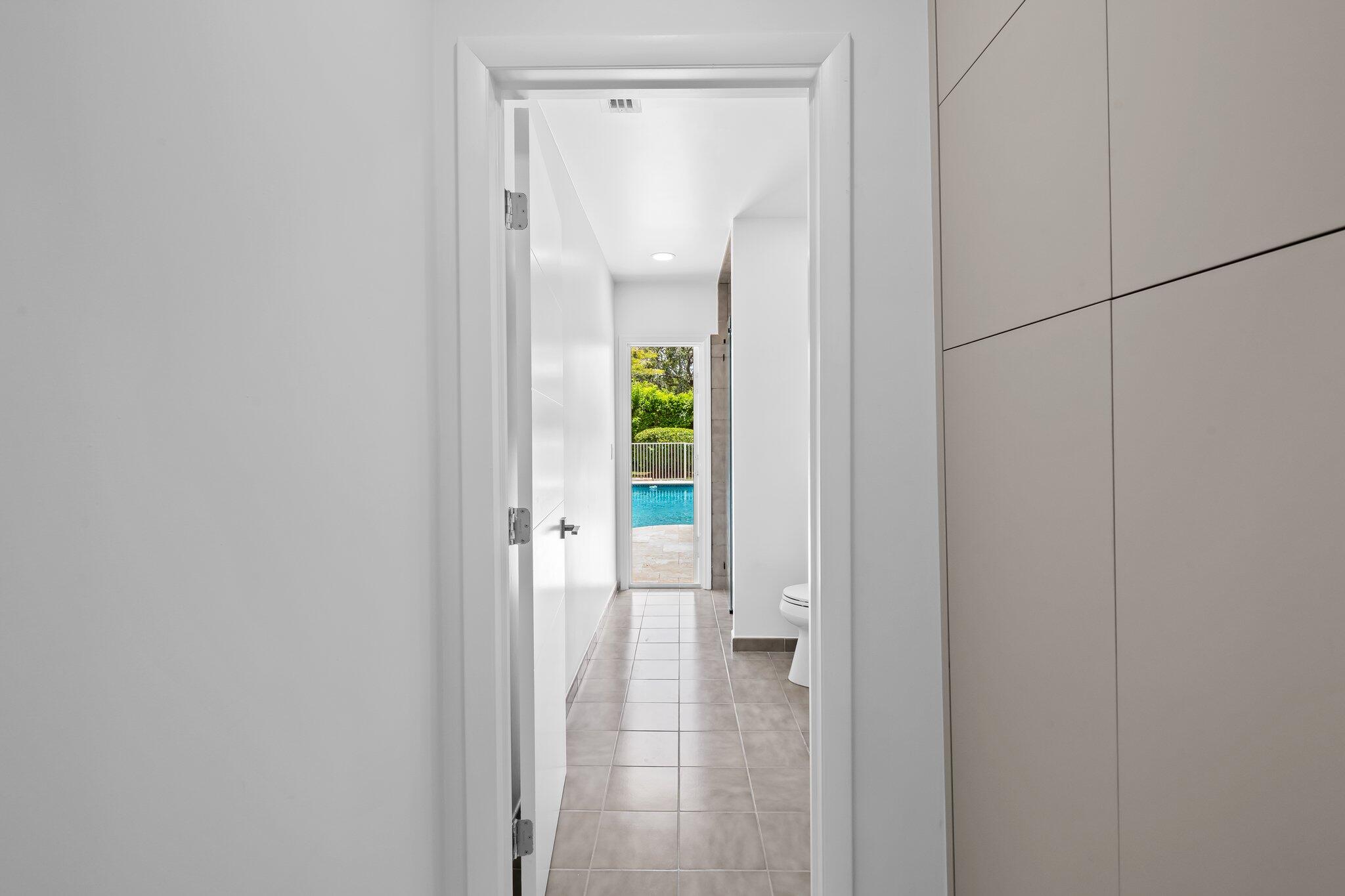 11937 Sandlake Drive Boca Raton, FL 33428 - Photo 44 of 54 a view of bathroom with a shower and a mirror