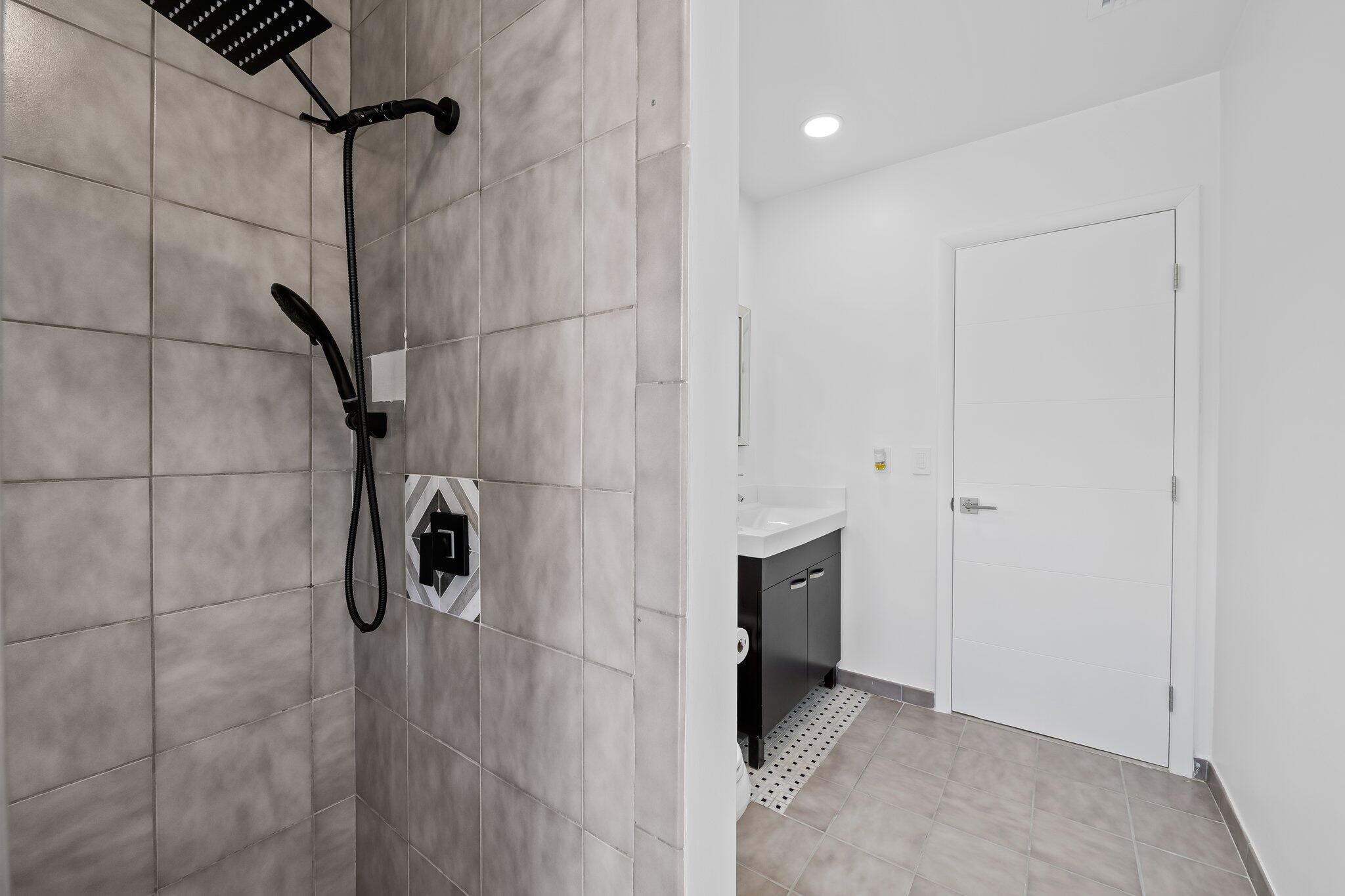 11937 Sandlake Drive Boca Raton, FL 33428 - Photo 46 of 54 a bathroom with a shower