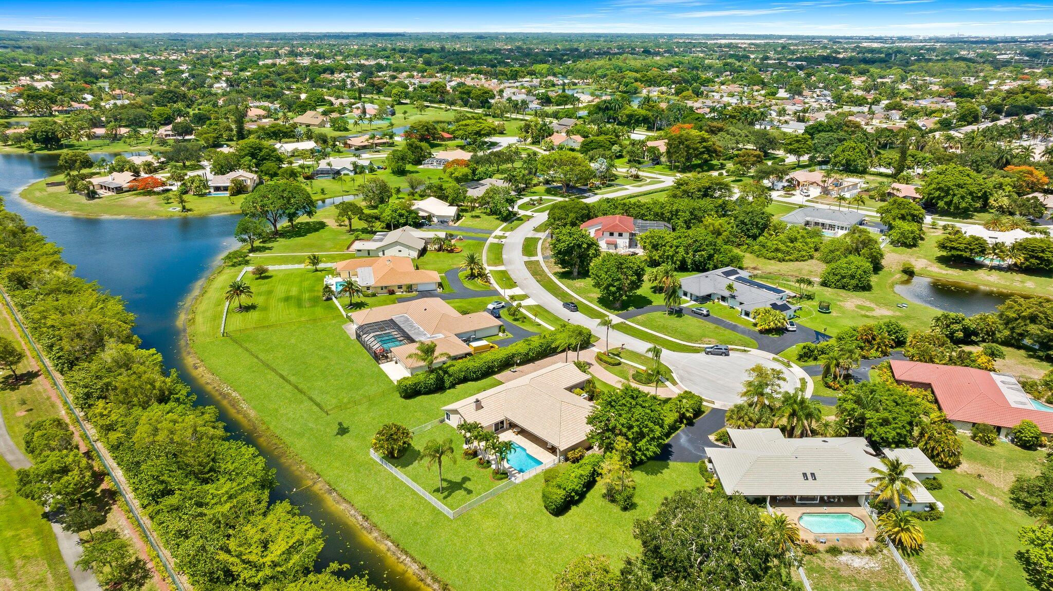 11937 Sandlake Drive Boca Raton, FL 33428 - Photo 9 of 54 an aerial view of a residential houses with outdoor space