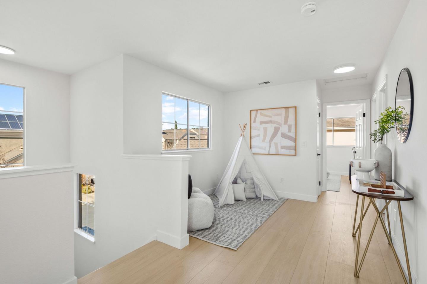 107 Beacon Street Mountain View, CA 94040 - Photo 22 of 55 a living room with furniture and a wooden floor