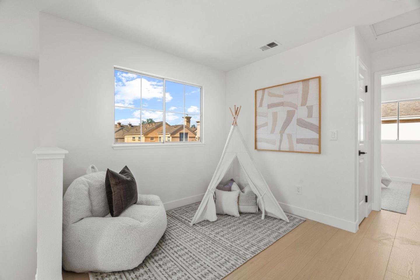 107 Beacon Street Mountain View, CA 94040 - Photo 23 of 55 a living room with furniture and a couch