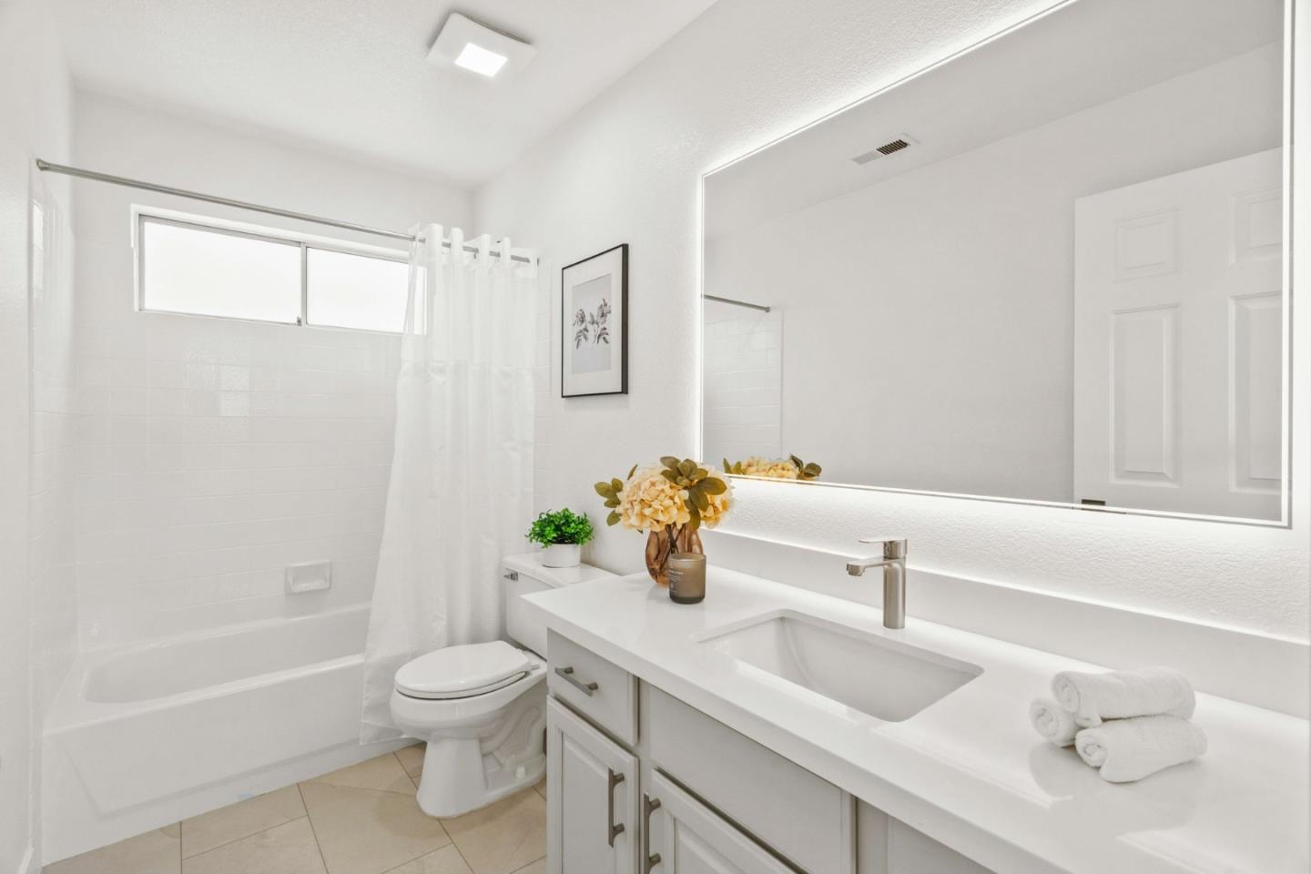 107 Beacon Street Mountain View, CA 94040 - Photo 30 of 55 a bathroom with a granite countertop sink a toilet and shower