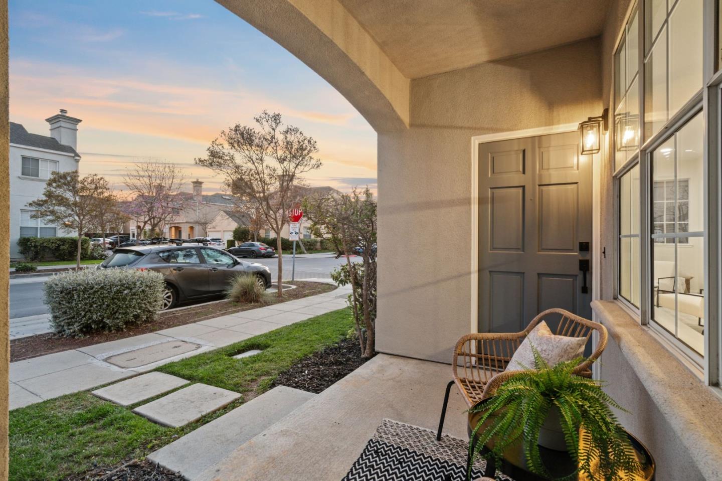 107 Beacon Street Mountain View, CA 94040 - Photo 34 of 55 a view of a porch with couches potted plants and a building