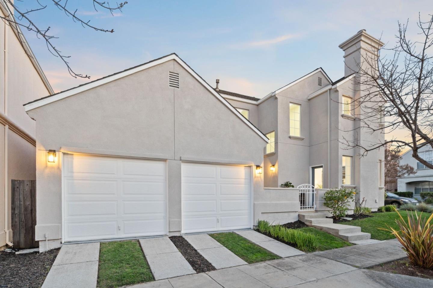 107 Beacon Street Mountain View, CA 94040 - Photo 36 of 55 a front view of a house with a yard and garage