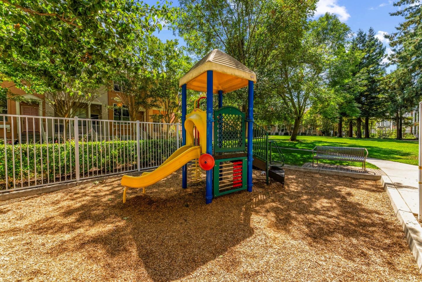 107 Beacon Street Mountain View, CA 94040 - Photo 46 of 55 a view of a park with slide and a bench