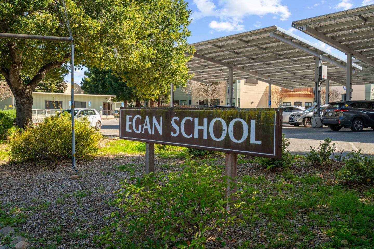107 Beacon Street Mountain View, CA 94040 - Photo 51 of 55 a view of a street sign under a large tree