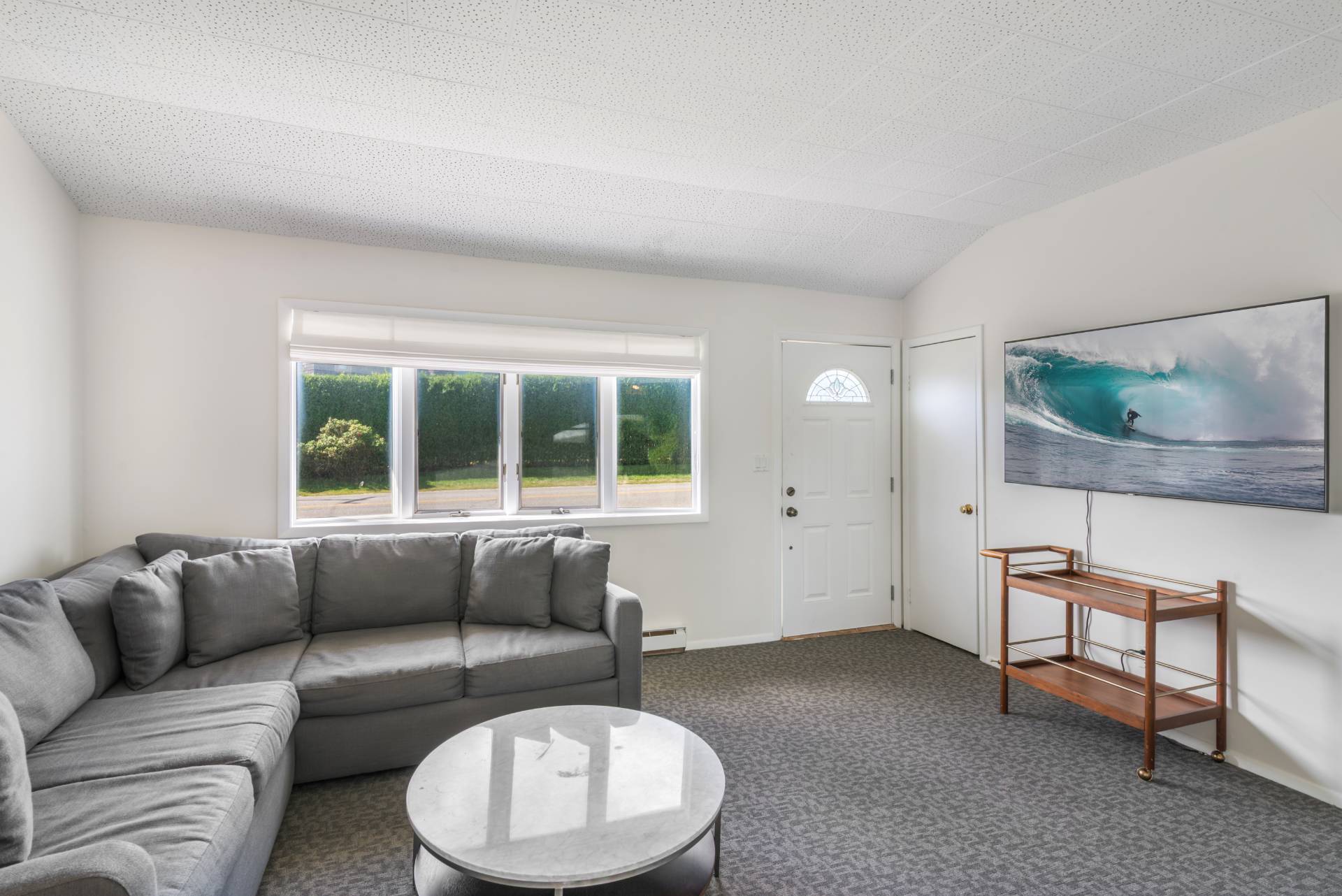 19 Deforest Road Montauk, NY 11954 - Photo 11 of 20 a living room with furniture and a large window