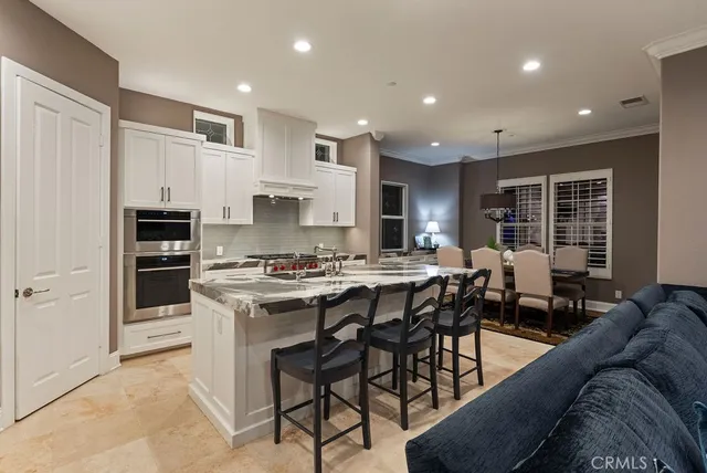 a en suite bathroom with a sink and a mirror