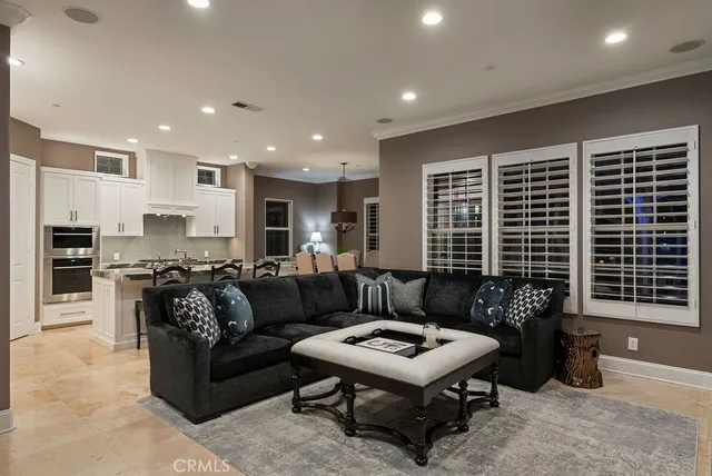 a kitchen with a table and chairs in it