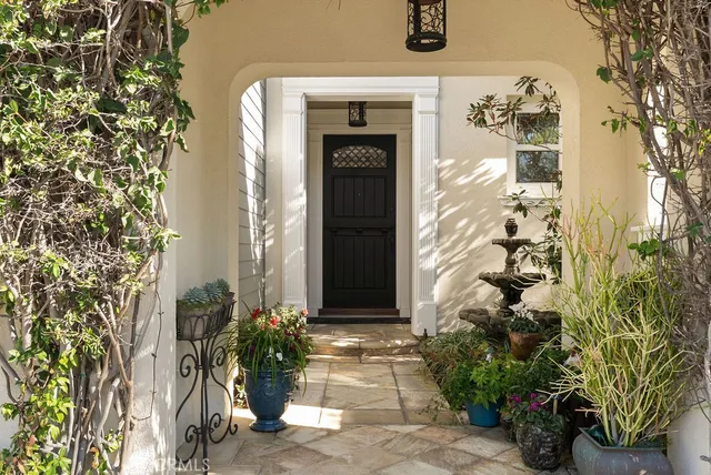 a view of a backyard of the house