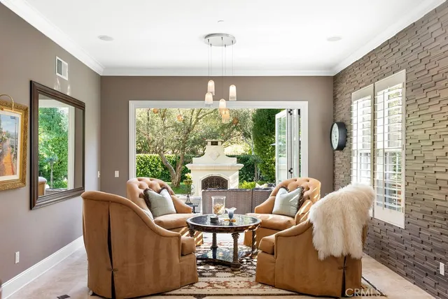 a street sign on a wall next to a road