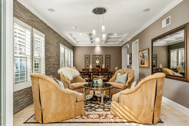 a view of swimming pool with a table and chairs