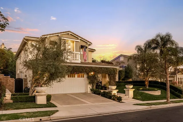 a bedroom with furniture and a large window