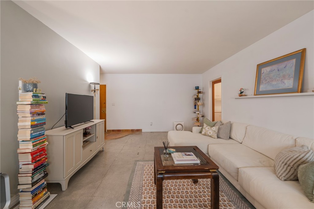 8710 Delgany Avenue, Unit 3 Playa del Rey, CA 90293 - Photo 20 of 34 a living room with furniture and a flat screen tv