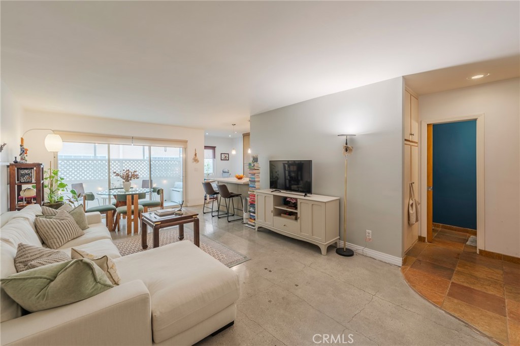 8710 Delgany Avenue, Unit 3 Playa del Rey, CA 90293 - Photo 21 of 34 a living room with furniture and a flat screen tv
