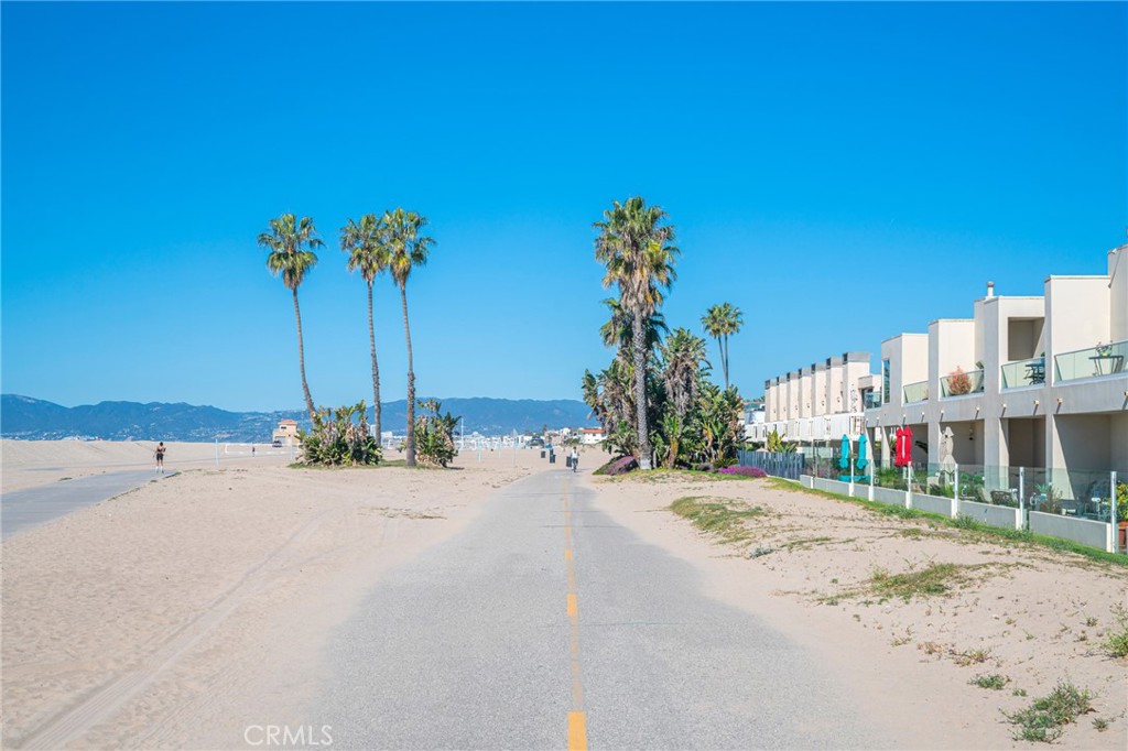8710 Delgany Avenue, Unit 3 Playa del Rey, CA 90293 - Photo 33 of 34 a view of a street with a building in the background