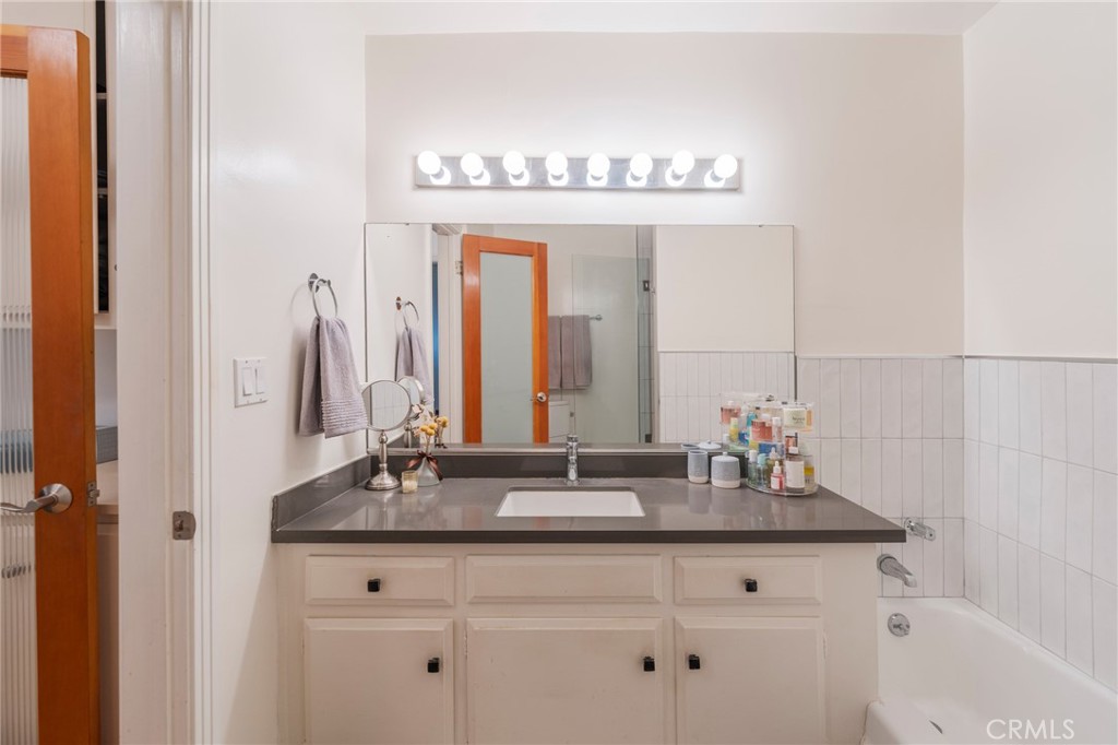 8710 Delgany Avenue, Unit 3 Playa del Rey, CA 90293 - Photo 6 of 34 a bathroom with a sink and a mirror