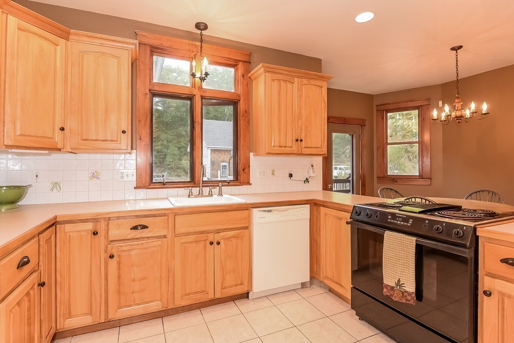 20 Harriman Road Merrimac, MA 01860 - Photo 11 of 30 a kitchen with a stove sink and cabinets