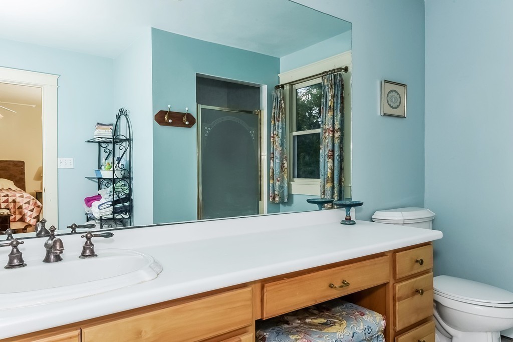20 Harriman Road Merrimac, MA 01860 - Photo 18 of 30 a bathroom with a sink and a large mirror