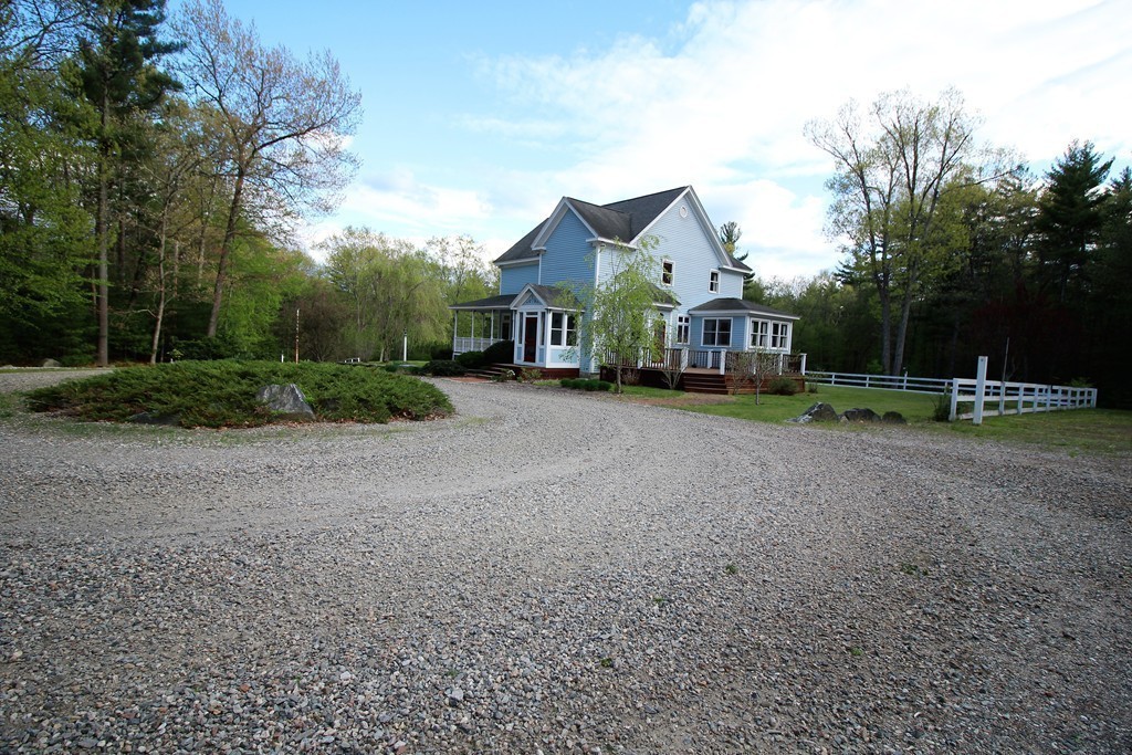 20 Harriman Road Merrimac, MA 01860 - Photo 22 of 30 a front view of a house with garden