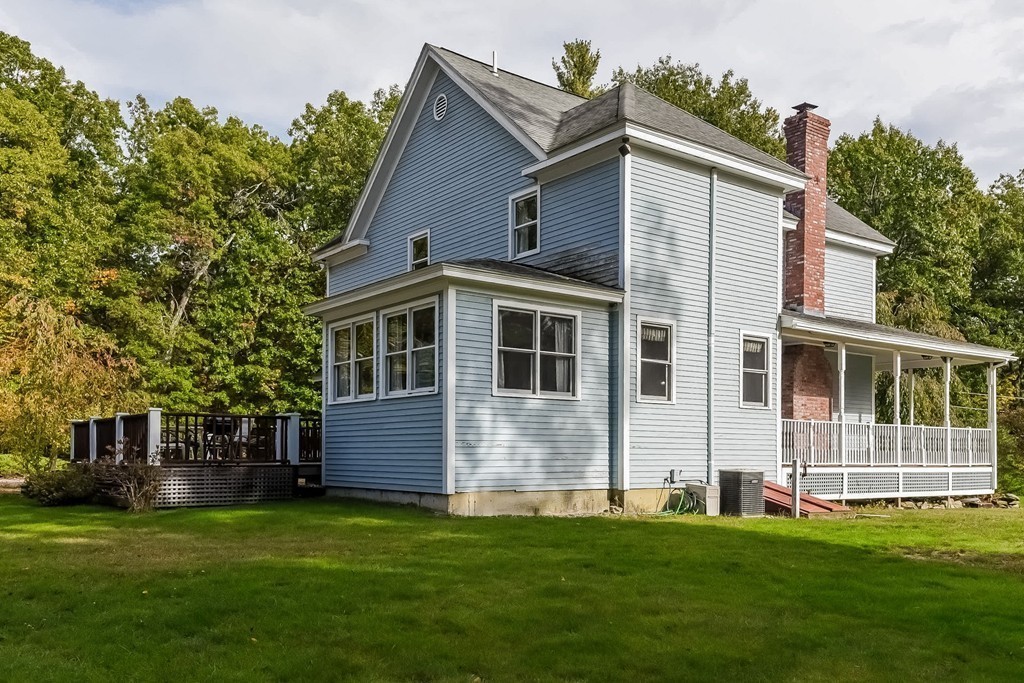 20 Harriman Road Merrimac, MA 01860 - Photo 23 of 30 a front view of a house with a garden