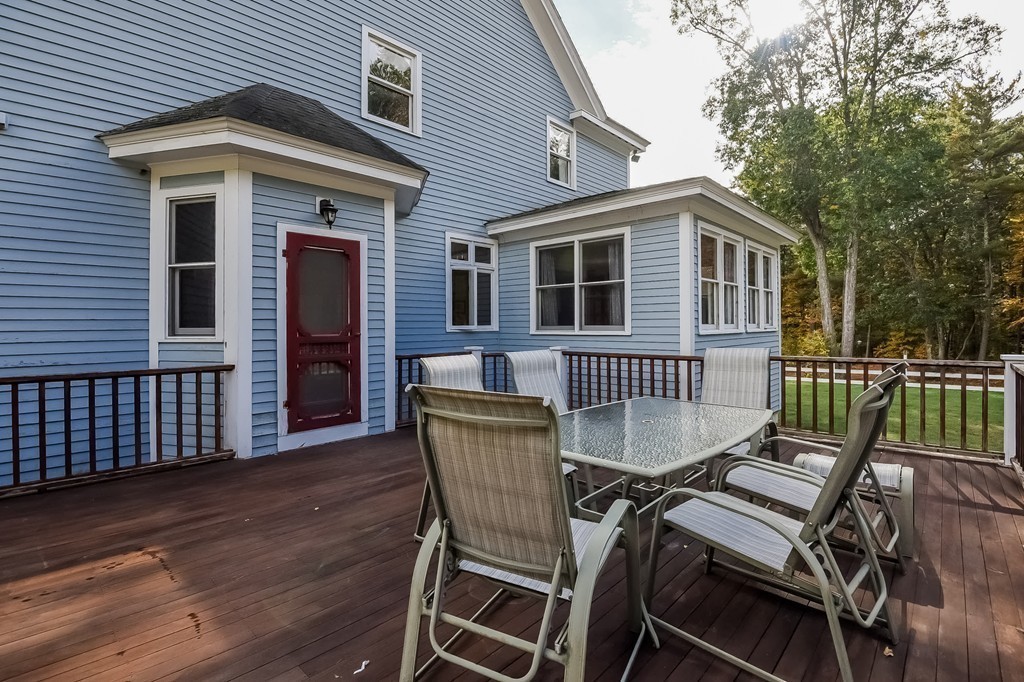 20 Harriman Road Merrimac, MA 01860 - Photo 5 of 30 a view of a patio with a table and chairs