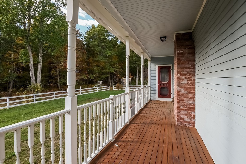 20 Harriman Road Merrimac, MA 01860 - Photo 8 of 30 a view of a balcony with wooden floor