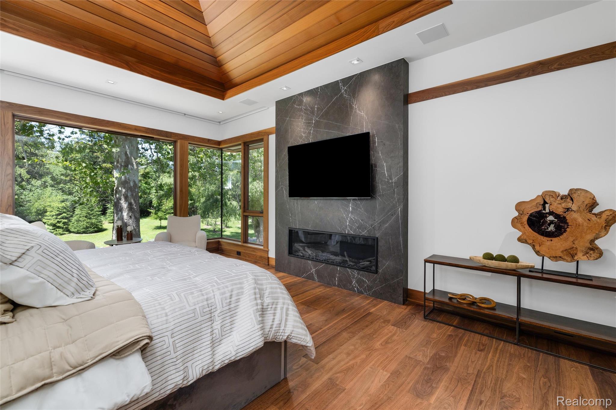 2700 Squirrel Road Bloomfield Hills, MI 48304 - Photo 30 of 83 Wood-finish flooring throughout, complemented by a sloped wood-paneled ceiling