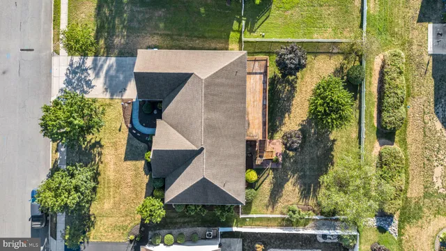 a kitchen with stainless steel appliances granite countertop a refrigerator a sink and a granite counter tops