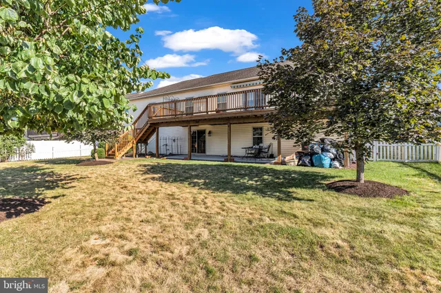 a view of a chandelier in an empty room