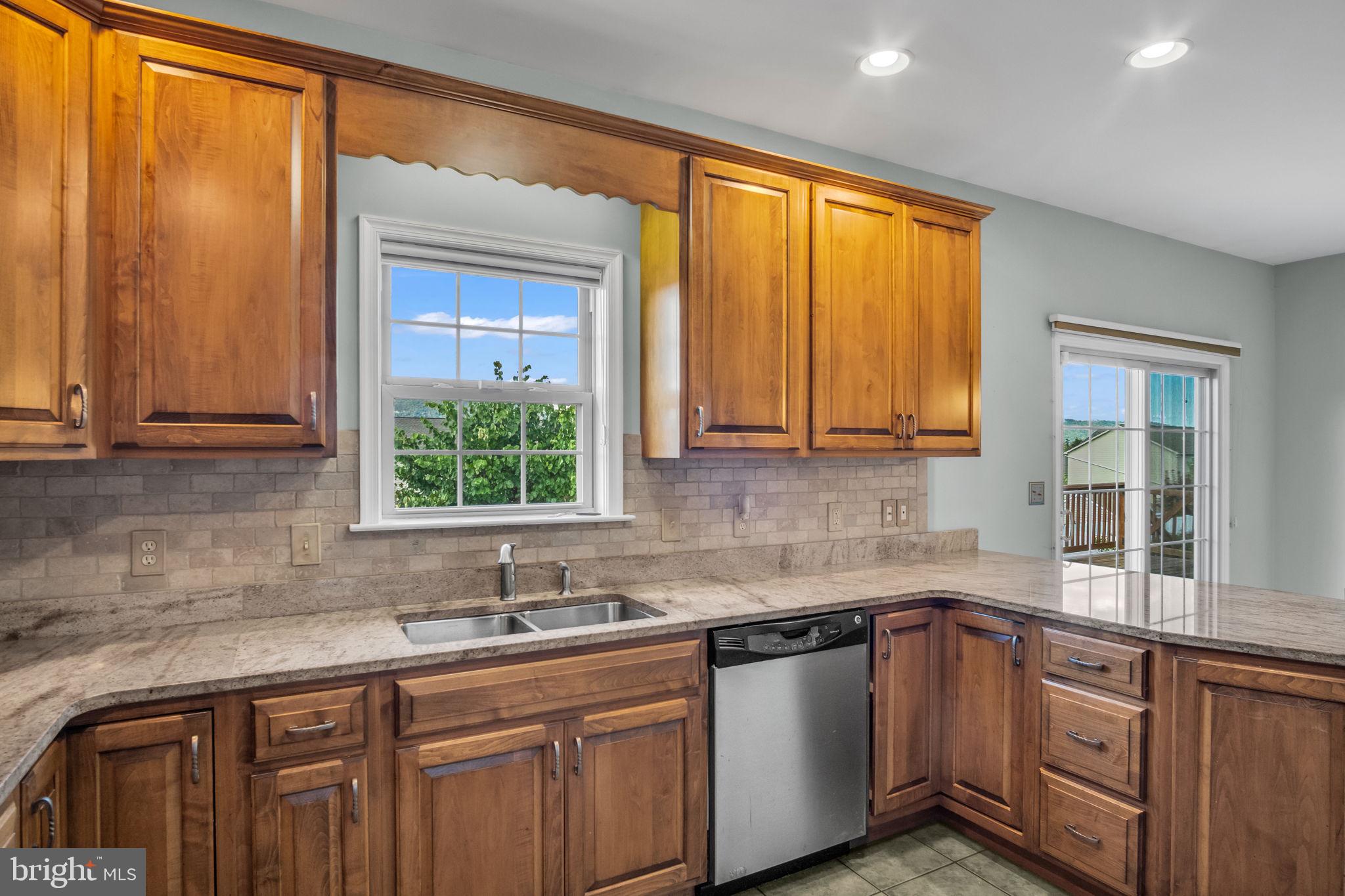 4 Over View Carlisle, PA 17013 - Photo 22 of 73 a kitchen with stainless steel appliances a sink cabinets and a window