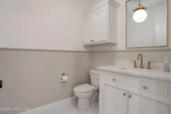 a white bath tub sitting in a bathroom