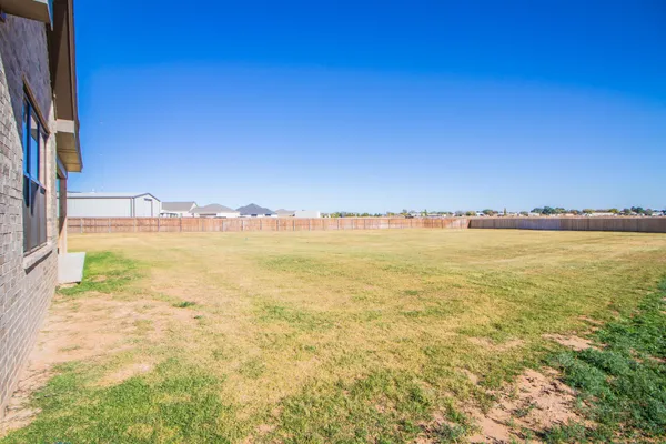 a picture of a bathroom with a shower