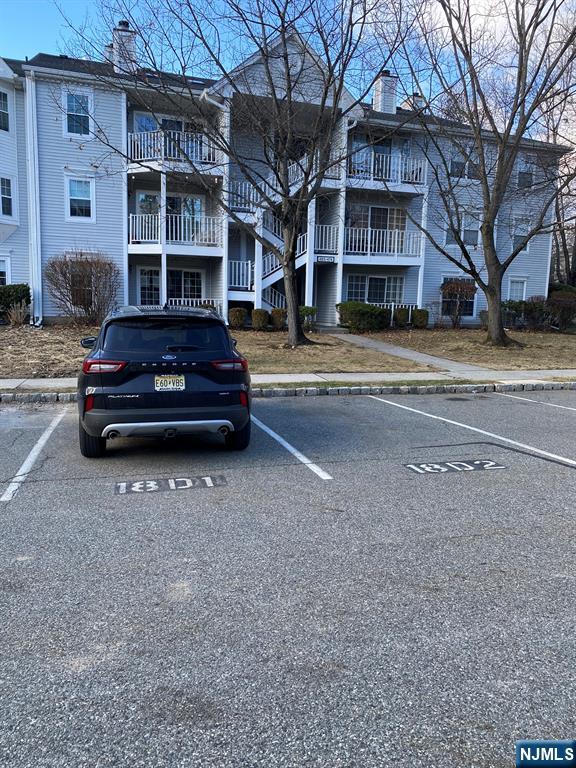 a car parked in front of a house