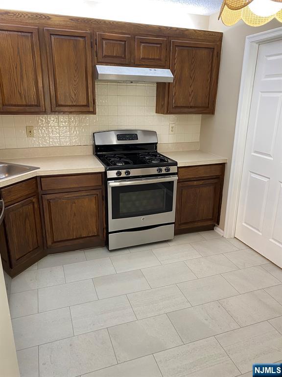 472 Quince Court Mahwah, NJ 07430 - Photo 2 of 8 a kitchen with cabinets and appliances