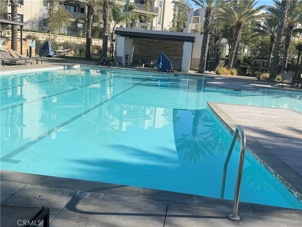 a view of a backyard with sitting area
