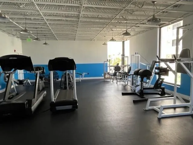 a living room with a couch and a rug