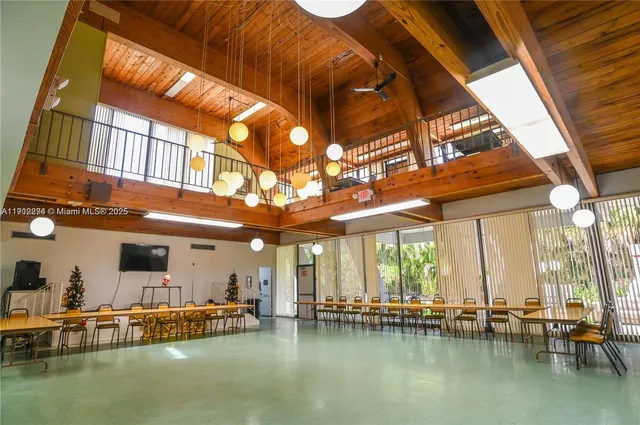 a view of a swimming pool and a lawn chairs