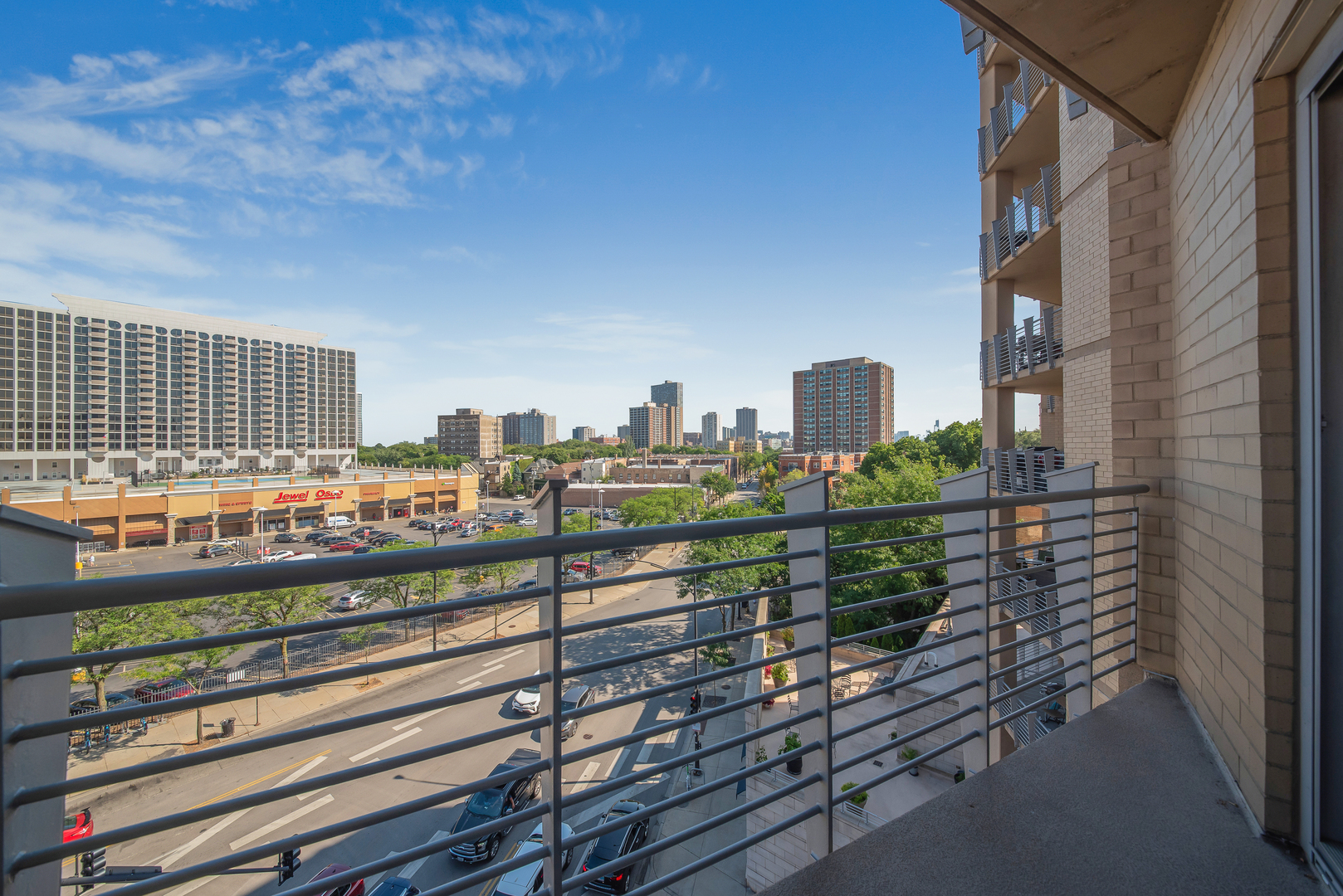 4350 North Broadway, Unit 607 Chicago, IL 60613 - Photo 16 of 18 a city view from a balcony