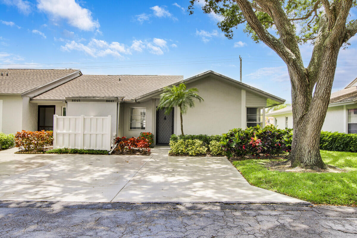 8641 Sunbird Place Boca Raton, FL 33496 - Photo 1 of 24 a view of a house with a patio