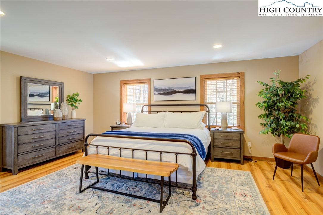 256 Holiday Hills Drive Boone, NC 28607 - Photo 23 of 34 a bedroom with furniture and a window