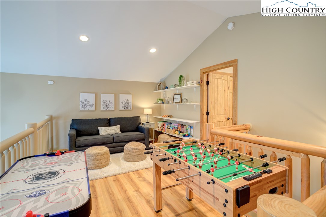 256 Holiday Hills Drive Boone, NC 28607 - Photo 27 of 34 a living room with furniture and a table