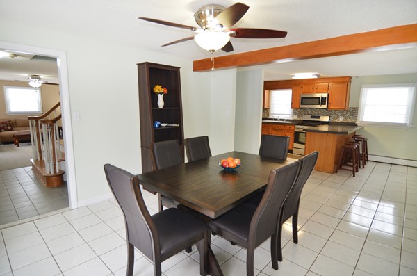 3 Eclipse Avenue Chelmsford, MA 01824 - Photo 4 of 6 a view of a dining room with furniture