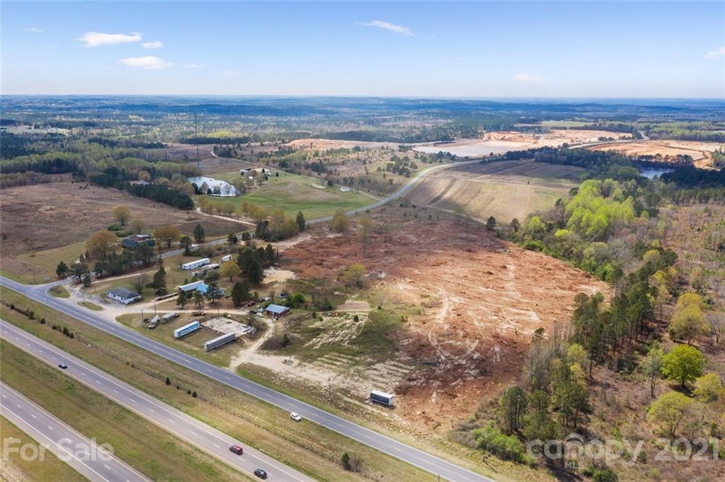 129 Yarborough Road Candor, NC 27229 - Photo 14 of 19 a view of a sky from a terrace