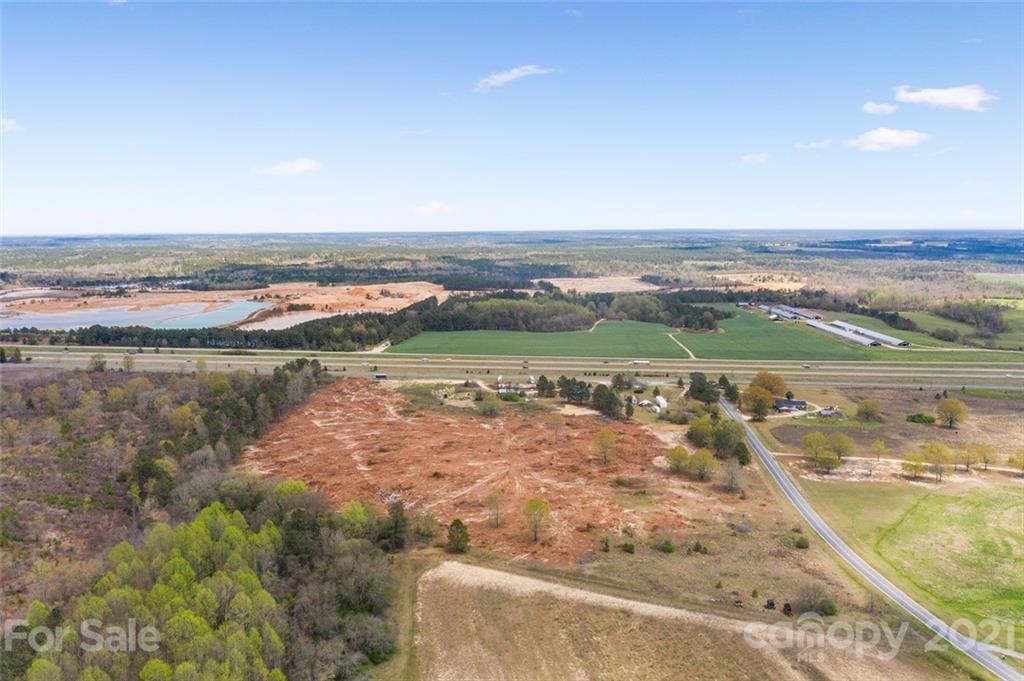 129 Yarborough Road Candor, NC 27229 - Photo 6 of 19 a view of a city with an ocean