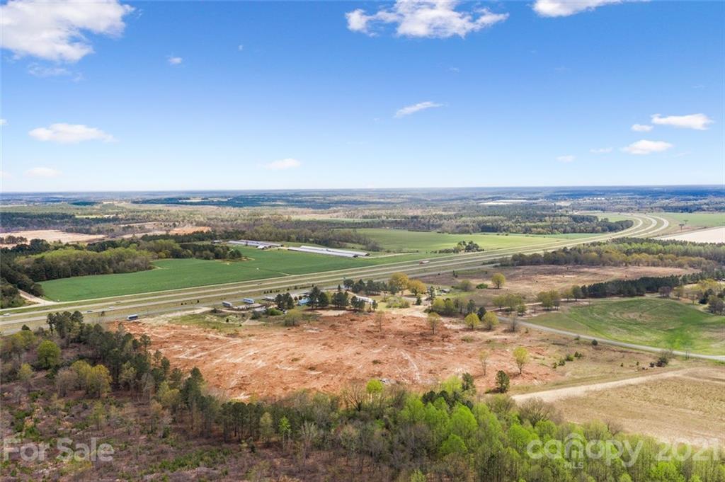 129 Yarborough Road Candor, NC 27229 - Photo 8 of 19 a view of a city with an ocean view