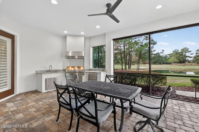 a white bath tub sitting next to a window