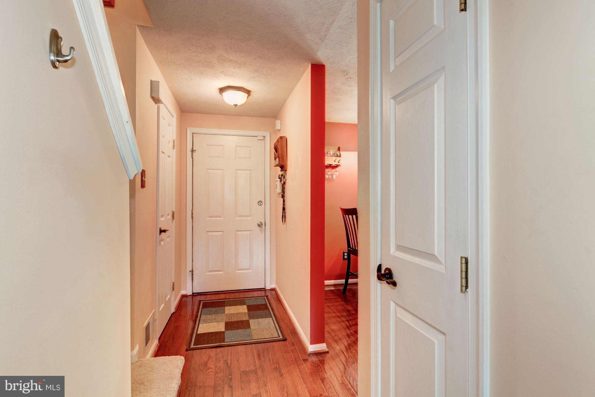 4204 Red Haven Road Baltimore, MD 21208 - Photo 4 of 30 with hardwoods, nice trim and updated hardware