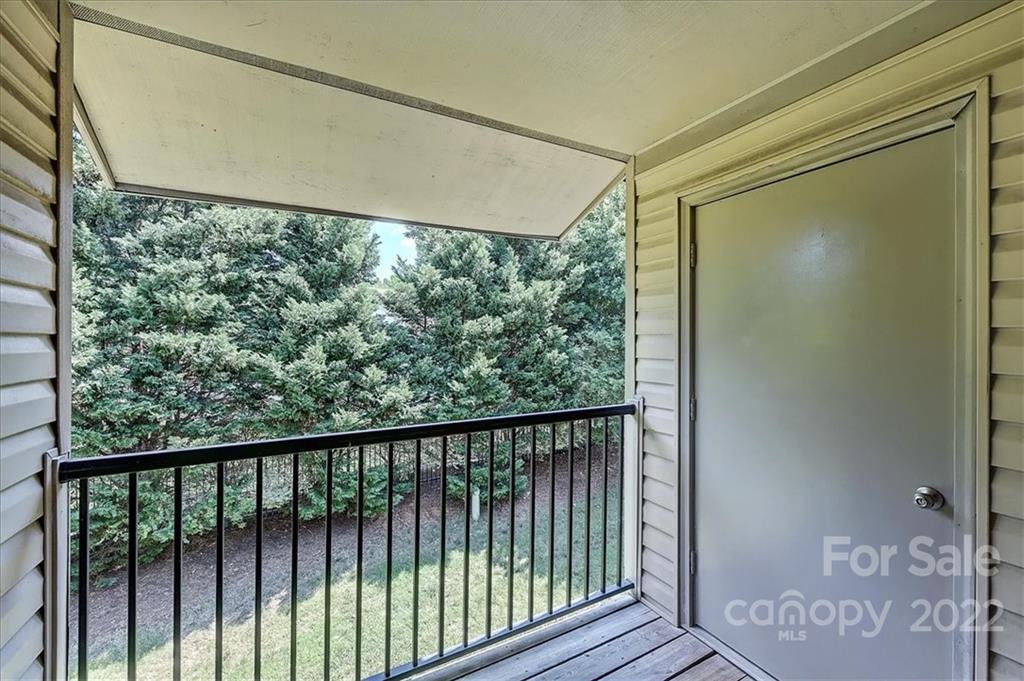 11019 Running Ridge Rd. Charlotte, NC 28226 - Photo 25 of 31 a view of a glass door with a balcony